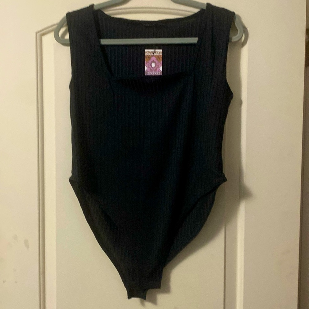 Women’s one piece stretch body suit   Made by Boohoo. Size 16 new with tags
